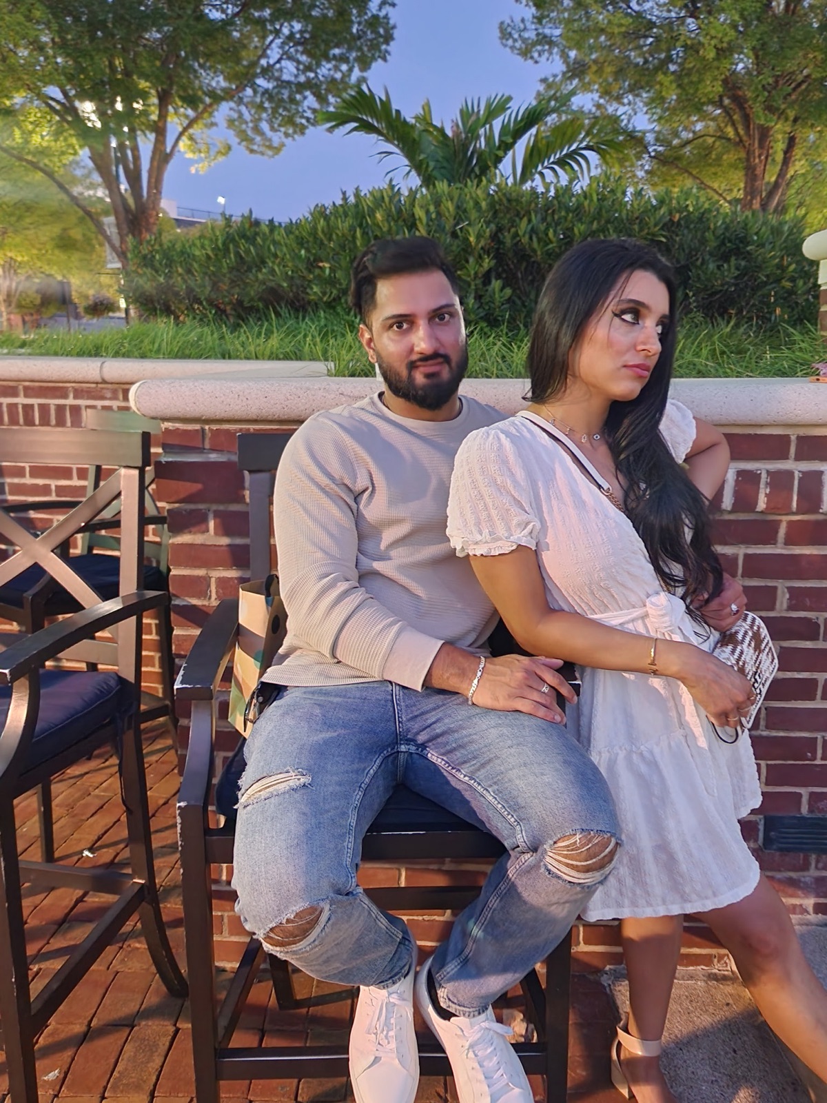 Jennifer and Samir on the patio at sunset